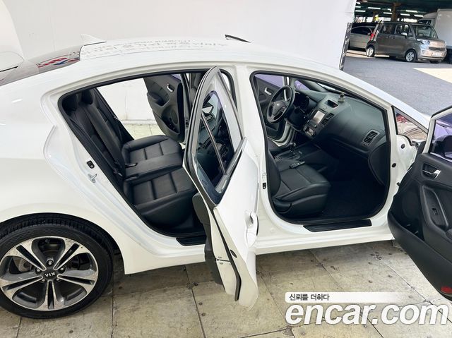 Kia K3 2013 — photo 19