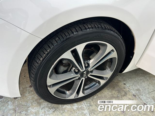 Kia K3 2013 — photo 20