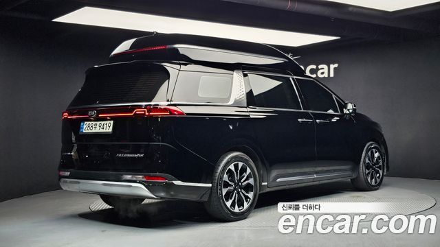 Kia Canival 2021 — photo 2