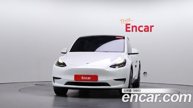 Tesla Model Y 2024 — photo 3