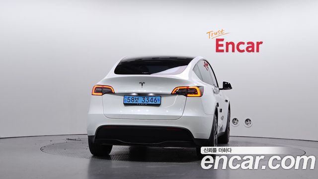 Tesla Model Y 2024 — photo 4