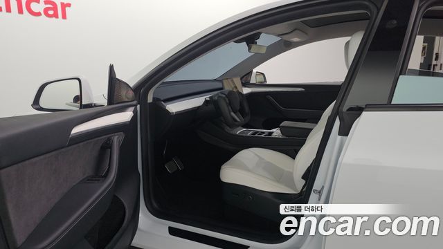 Tesla Model Y 2024 — photo 13