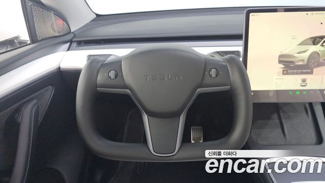 Tesla Model Y 2024 — photo 17