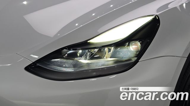 Tesla Model Y 2024 — photo 8