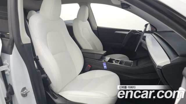 Tesla Model Y 2024 — photo 16