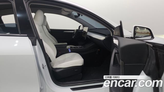 Tesla Model Y 2024 — photo 34