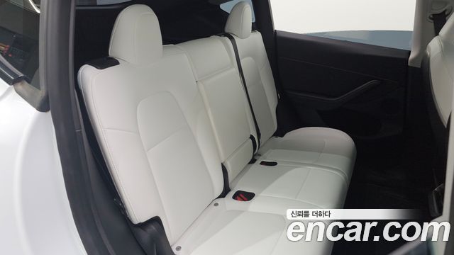 Tesla Model Y 2024 — photo 35