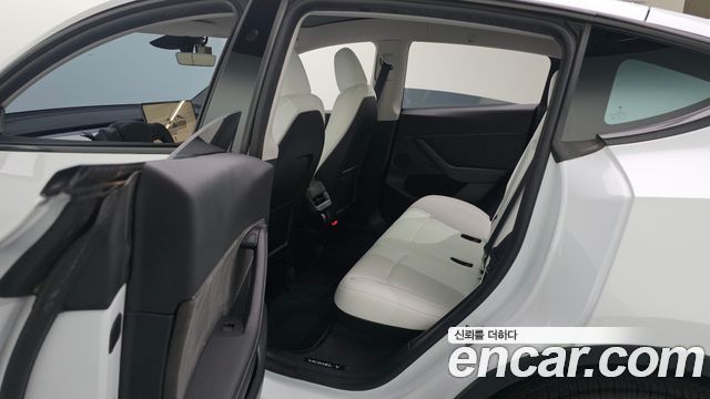 Tesla Model Y 2024 — photo 36