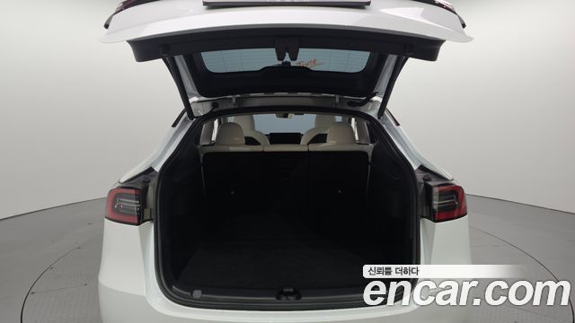 Tesla Model Y 2024 — photo 38