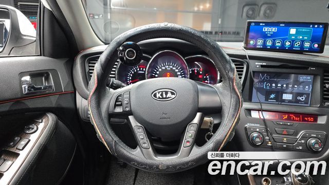 Kia K5 2011 — photo 13