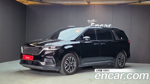 Kia Canival 2023 — photo 1