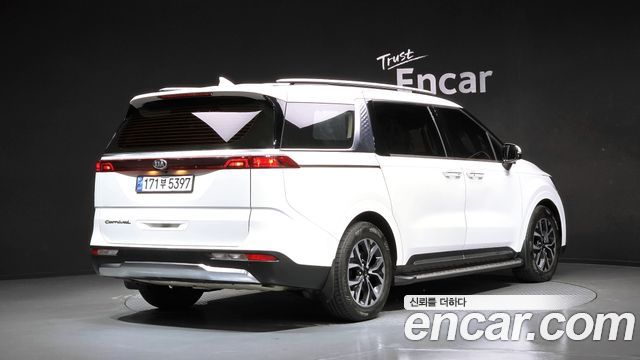Kia Canival 2021 — photo 2