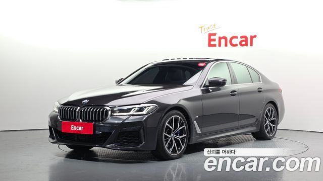 BMW 5-Series 2023 — photo 1