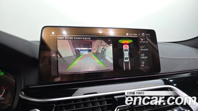 BMW 5-Series 2023 — photo 21