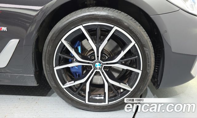 BMW 5-Series 2023 — photo 7