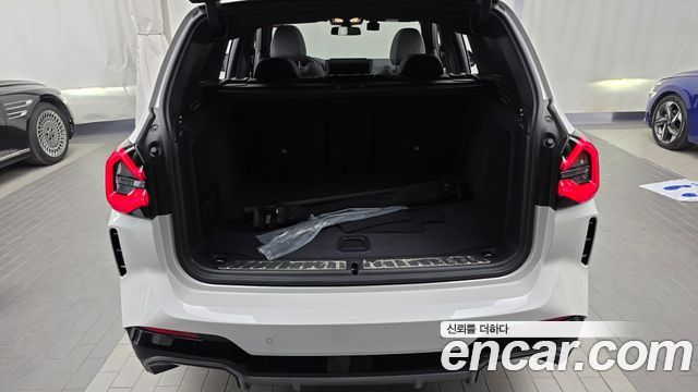 BMW iX3 2024 — photo 26