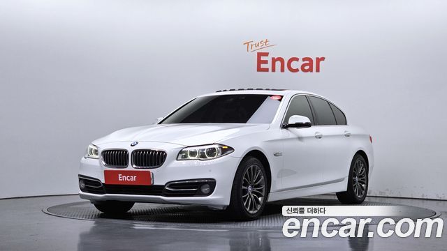 BMW 5-Series 2015 — photo 1