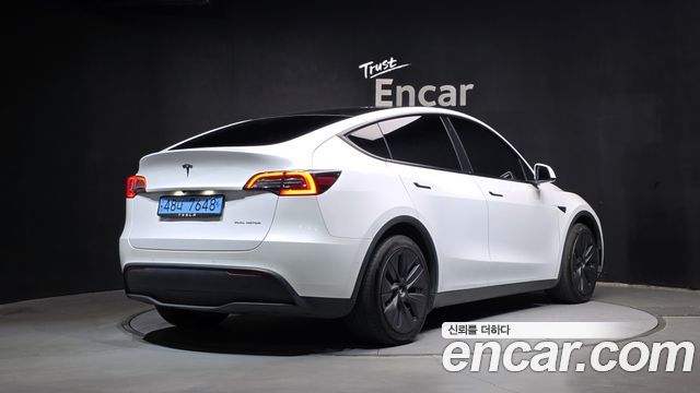Tesla Model Y 2022 — photo 2