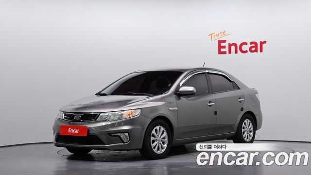 Kia Porte 2010 — photo 1