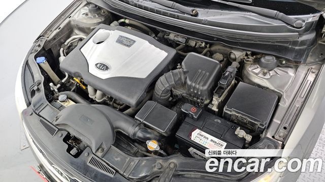 Kia Porte 2010 — photo 6