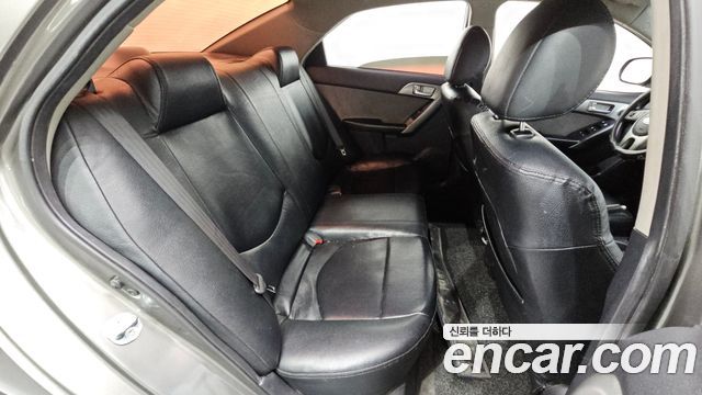 Kia Porte 2010 — photo 11