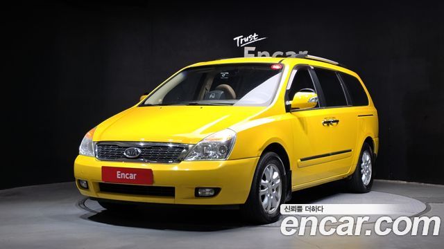 Kia Canival 2012 — photo 1