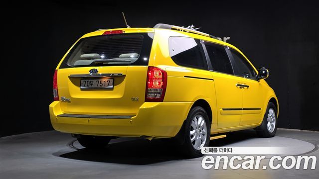 Kia Canival 2012 — photo 2