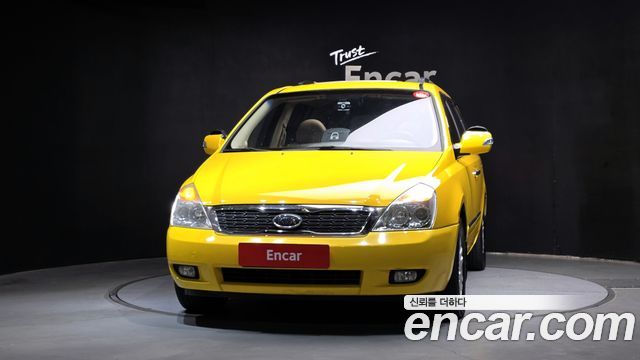 Kia Canival 2012 — photo 3