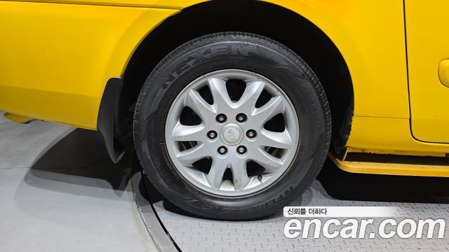 Kia Canival 2012 — photo 5