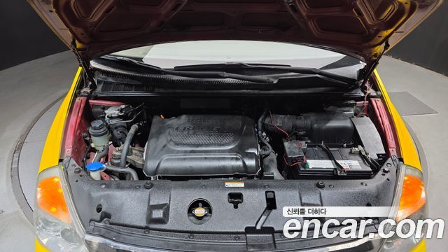 Kia Canival 2012 — photo 6