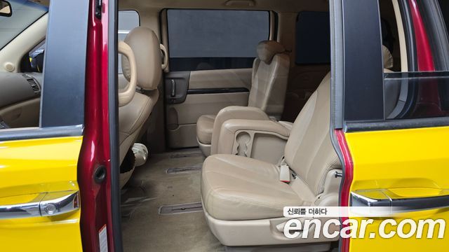 Kia Canival 2012 — photo 18