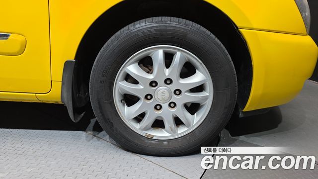 Kia Canival 2012 — photo 7