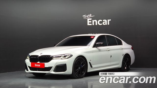 BMW 5-Series 2023 — photo 1