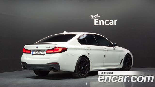 BMW 5-Series 2023 — photo 2