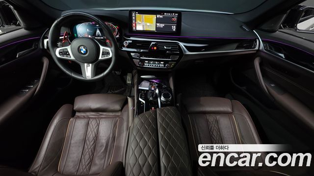 BMW 5-Series 2023 — photo 10
