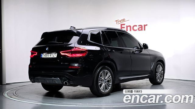 BMW X3 2021 — photo 2