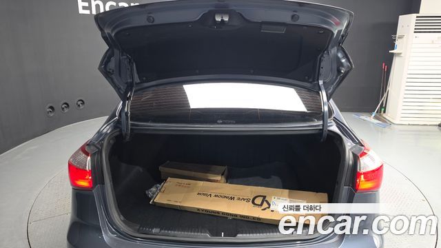 Kia K3 2015 — photo 26
