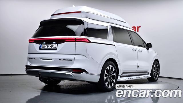 Kia Canival 2021 — photo 2