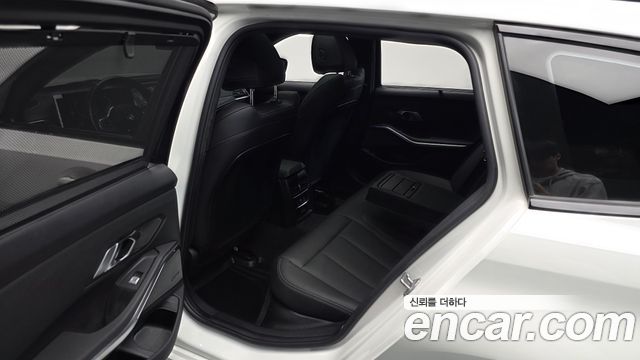 BMW 3-Series 2024 — photo 16