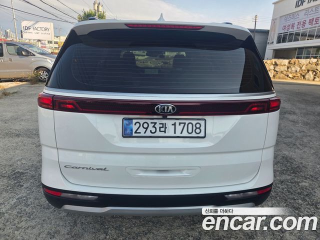 Kia Canival 2021 — photo 2