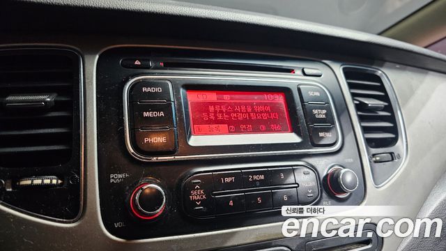 Kia Carens 2014 — photo 15