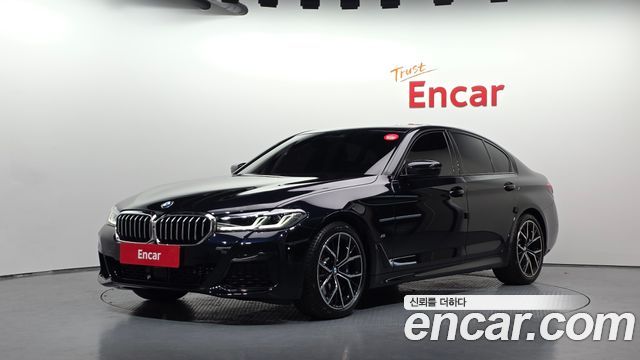 BMW 5-Series 2023 — photo 1