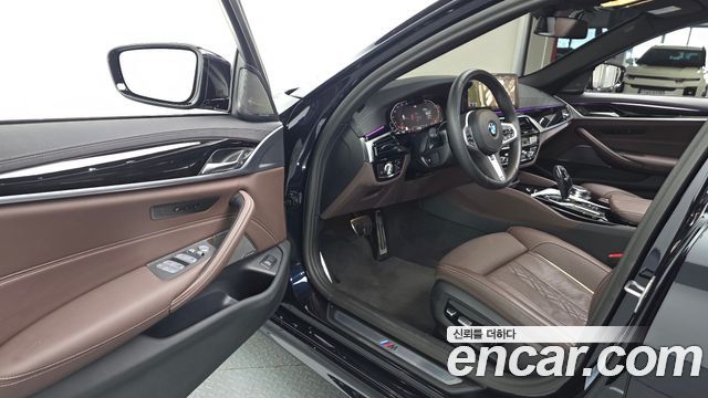 BMW 5-Series 2023 — photo 13