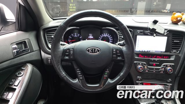 Kia K5 2011 — photo 13