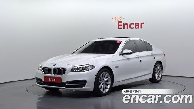 BMW 5-Series 2015 — photo 1