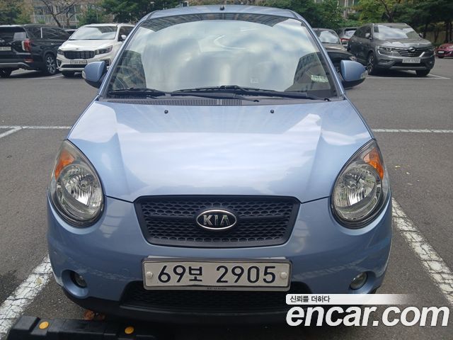 Kia morning 2009 — photo 1