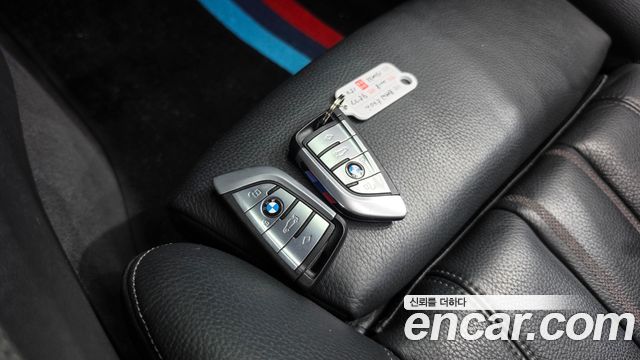BMW 5-Series 2018 — photo 18