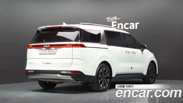 Kia Canival 2023 — photo 2
