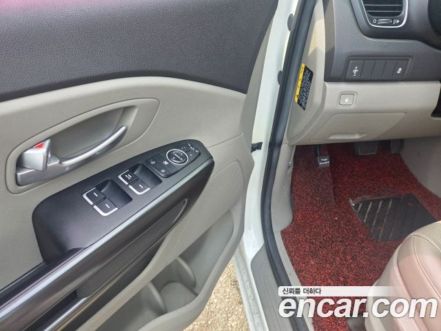 Kia Canival 2015 — photo 13