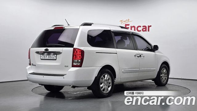 Kia Canival 2012 — photo 2